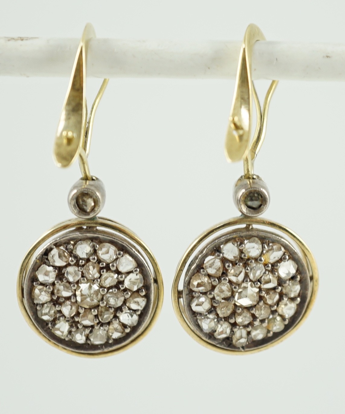 A pair of gold and rose cut diamond cluster set target drop earrings